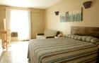 Chambre affaire 1 lit Queen&nbsp;&nbsp;&nbsp;&copy; Motel Le Martinet
