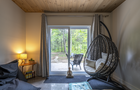 Salle de repos intérieure avec balançoire © S.Audesse