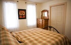Chambre principale © Chalet Lac Claude