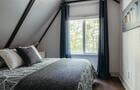 Chambre à l'étage avec lit queen © N.Côté