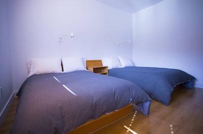 Chambre 2 lits doubles   © T.Asselin