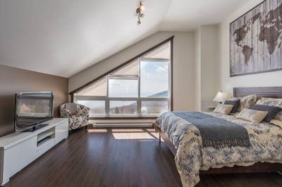 Chambre principale avec vue sur le fleuve