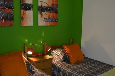 Chambre avec lits jumeaux   © Le P'tit chalet du Lac Paré