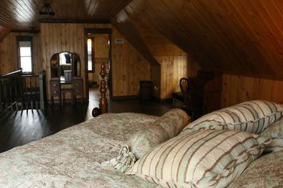 Chambre à coucher   © Maisons Et Chalets à Louer.Com