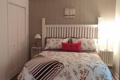 Chambre   © Le Chalet de la Rivière Ouareau