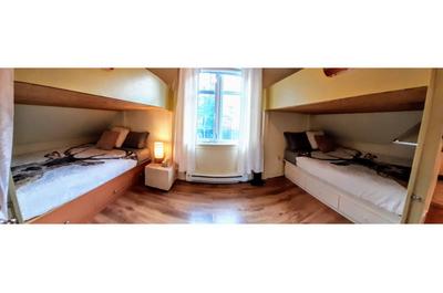Coin chambre muni 2 lits queen 2 lits simple hauts