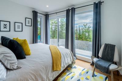 Chambre lit king avec vue
