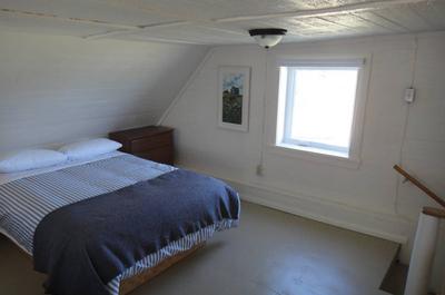 Chambre avec lit double   © Domaine Floravie