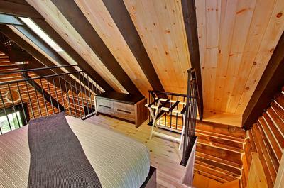 Chambre à coucher   © Au Chalet en Bois Rond