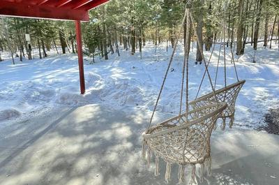 2 balançoires coin détente extérieur sous l'abri