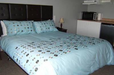 Chambre avec 1 grand lit   © Motel des Mariniers